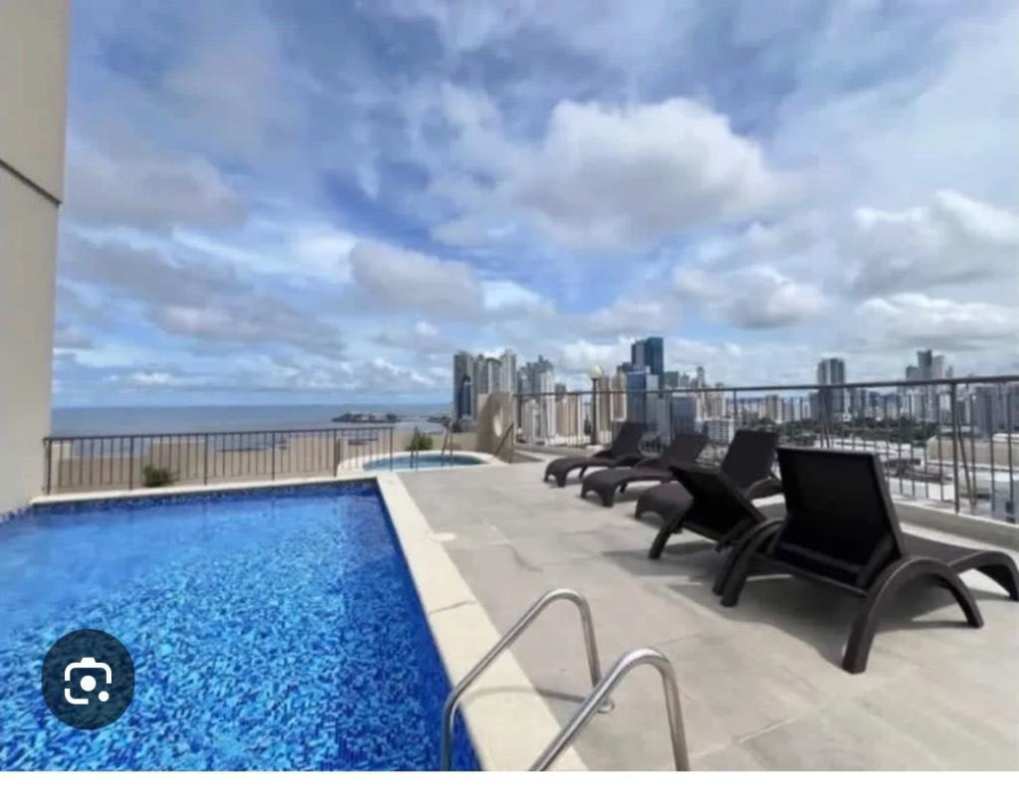 Rooftop swimming pool area with panoramic skyline ocean views at PH Torre Mar del Sur San Francisco Panama
