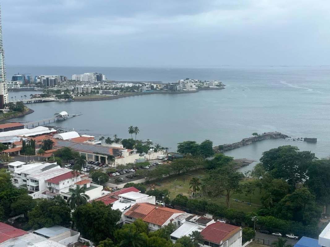 Aerial image of Punta Paitilla peninsula with high-rise towers along the Panama City waterfront