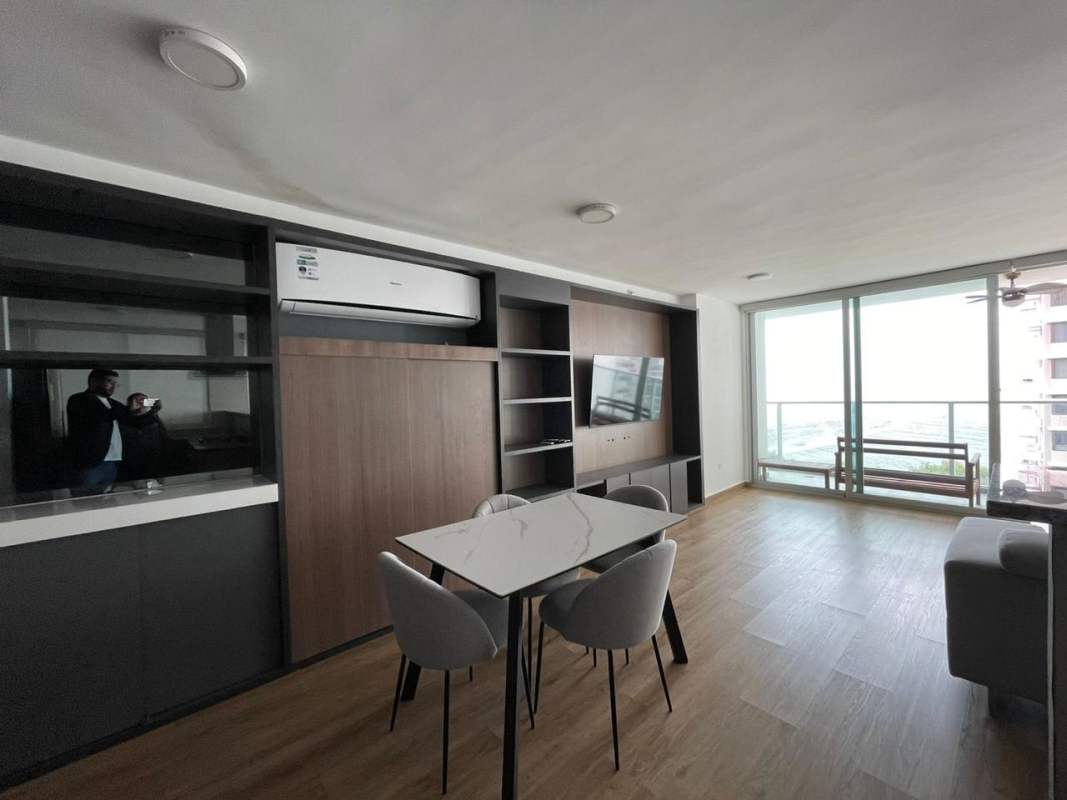 Furnished open living room balcony access city view PH Lumiere Costa del Este Panama