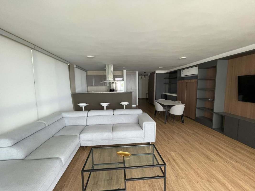 Minimalist bedroom with mirrored wall, large window, ocean view PH Lumiere Costa del Este Panama