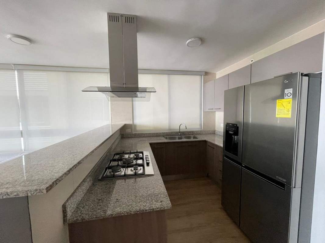 Kitchen granite counters gas stove stainless appliances PH Lumiere Costa del Este Panama