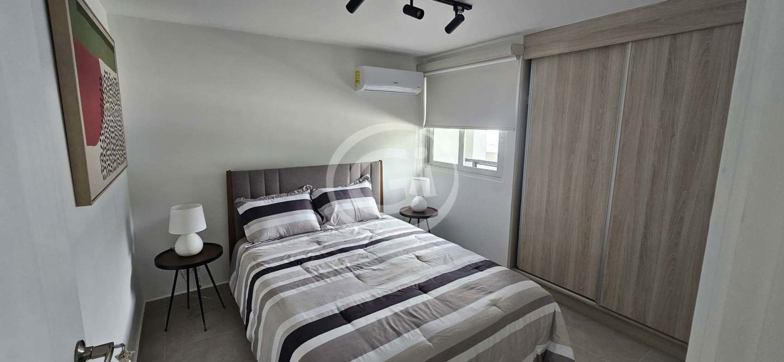 Bathroom with walk-in shower modern vanity neutral design Panamá Viejo Residences Panama City