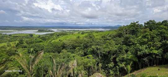 Small natural waterfall and rocks amid tropical forest on Panama countryside land