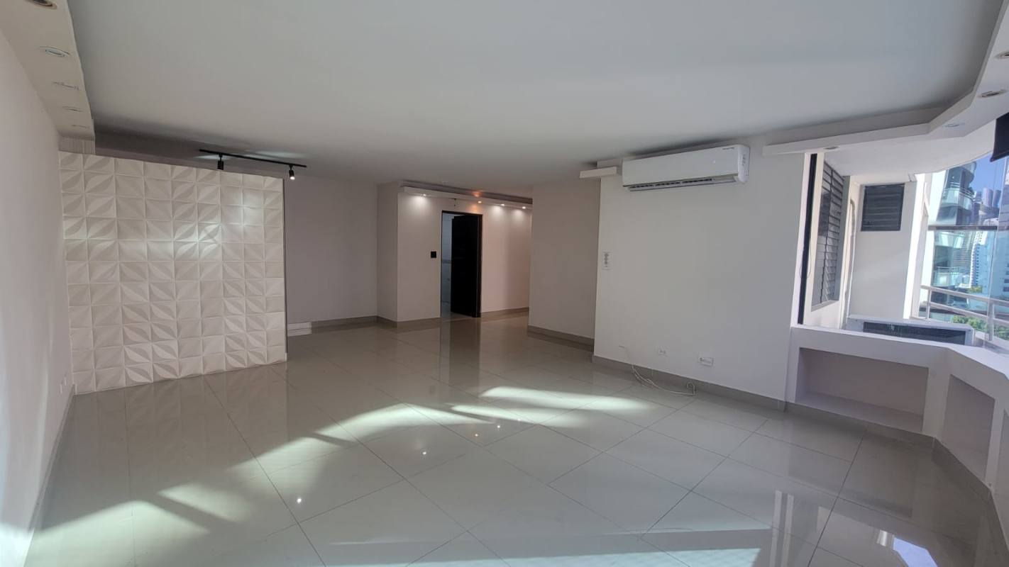 Spacious kitchen with granite countertops and tile backsplash in PH Brisas Obarrio Panama