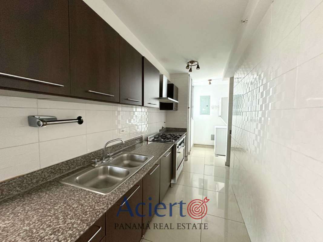 Contemporary closed kitchen, granite countertops, built-in cabinetry PH Bayfront Bella Vista Panama