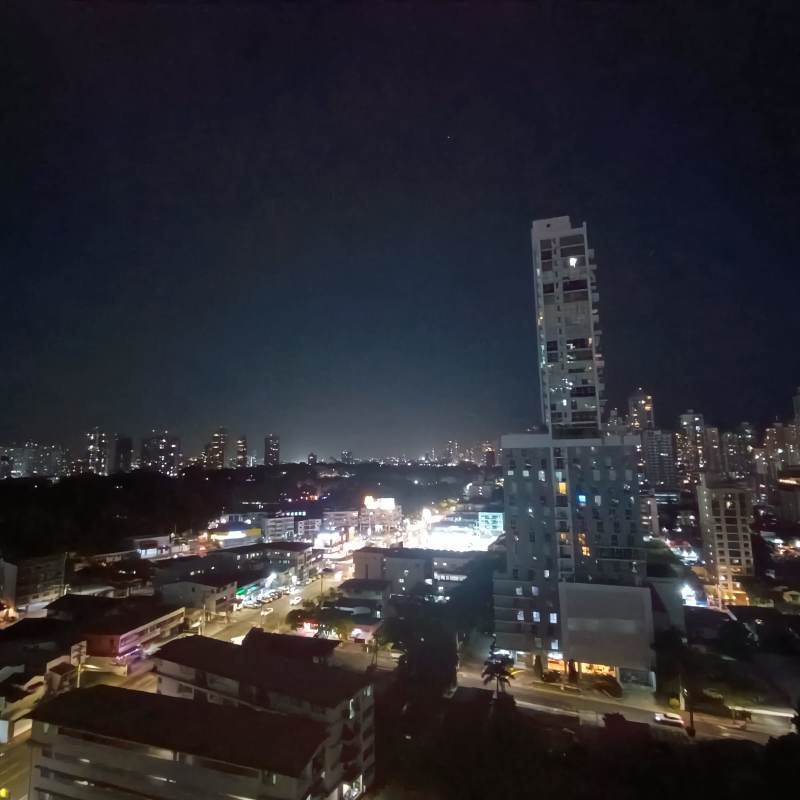 Night aerial view of Panama City skyline from high-rise apartment in PH San Francisco Bay