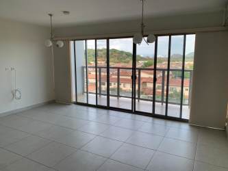 Bedroom featuring built-in closet and split AC unit at Midrise Tower 5 Panama Pacifico