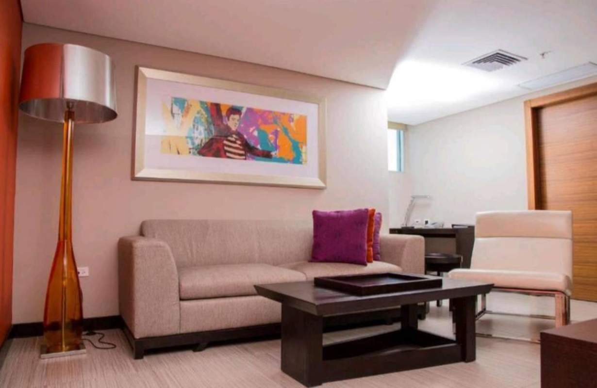 Elegant bathroom with mirror, vanity, and walk-in shower in Megapolis Tower Punta Pacifica Panama