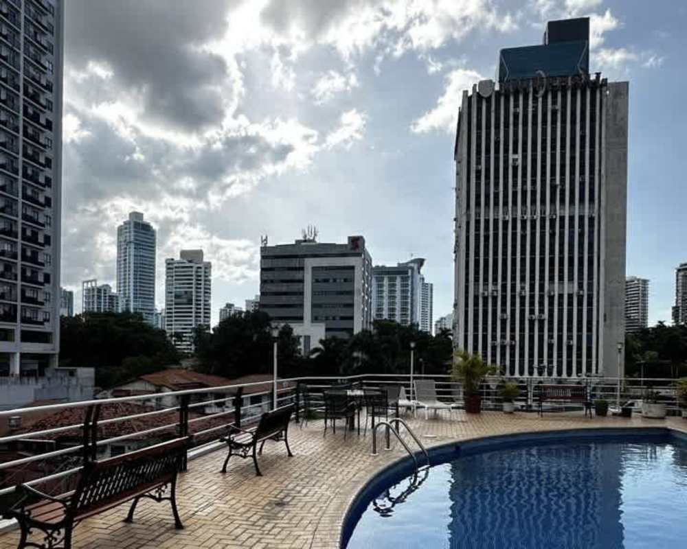Contemporary bathroom with marble tile and glass shower in PH Vista Tower Panama City