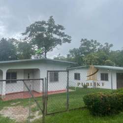 Spacious living room with tiled floors and open plan in Santa Rita house for sale