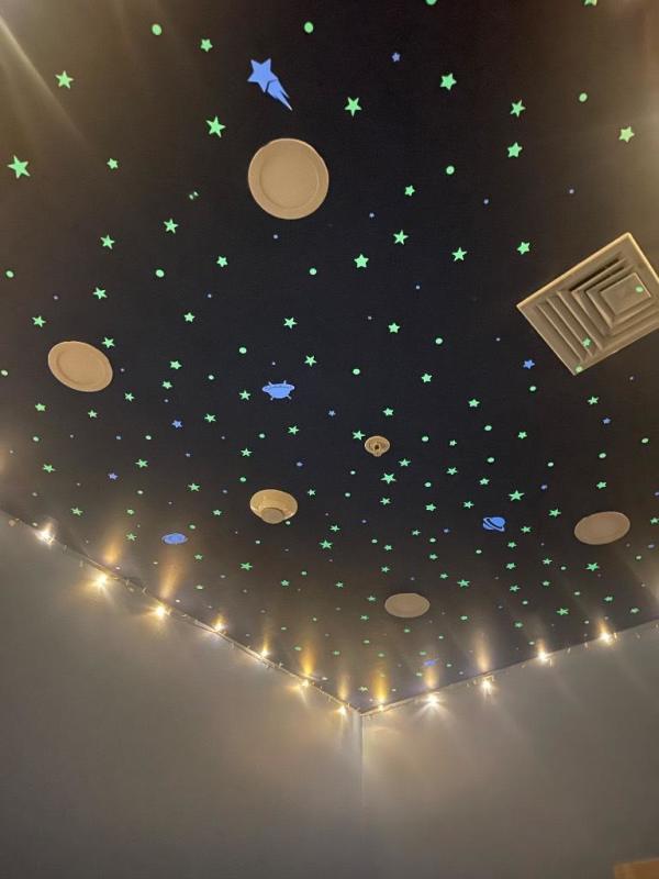 Ceiling night sky theme with stars in children's therapy room Medical Center Costa del Este