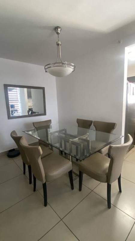 Dining area with open concept living room ceramic flooring Kings Park Panama City