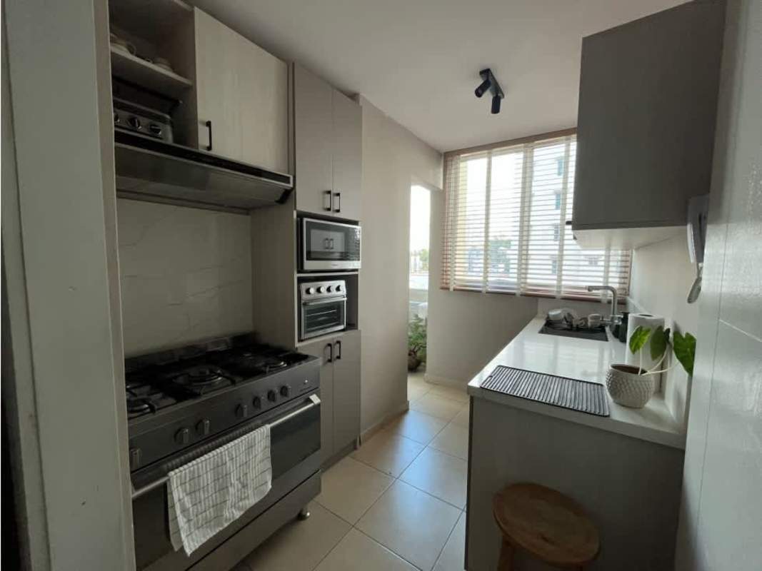 Bright modern kitchen with appliances in PH El Cangrejo furnished rental Panama