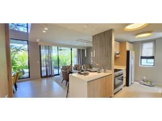 Spacious covered terrace with garden view in new house for sale Imaterra Panama Pacifico