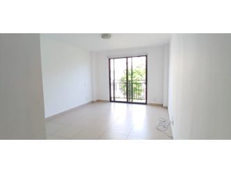Swimming pool area with palm trees in River Valley Panama Pacifico
