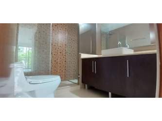 Bedroom with closet and garden views River Valley Panama Pacifico apartment