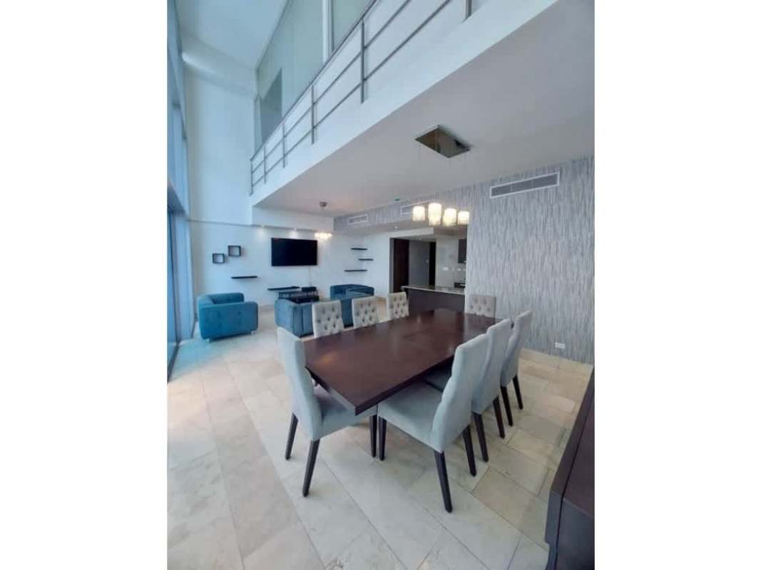 Open loft living-dining area double height with ocean views PH Oceania Punta Pacifica Panama