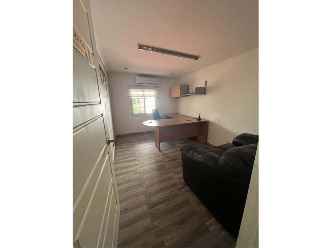 Multipurpose room with kitchenette and large windows in commercial property Panama