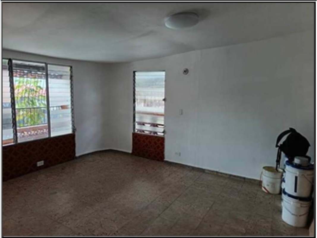 Additional bedroom with natural light and ceramic flooring in home for sale Panama City