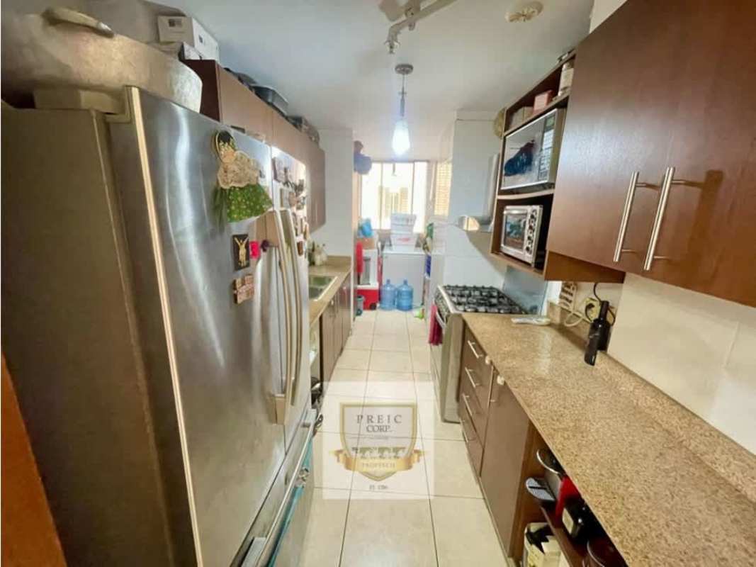 Contemporary kitchen with wooden cabinets granite counter and appliances PH Victoria Hills Hato Pintado Panama