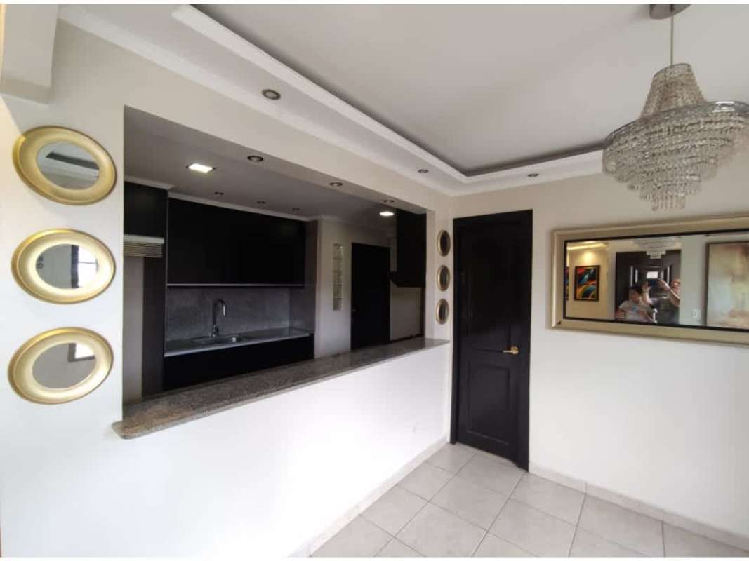 Open kitchen with granite counters and breakfast bar La Chorrera Panama