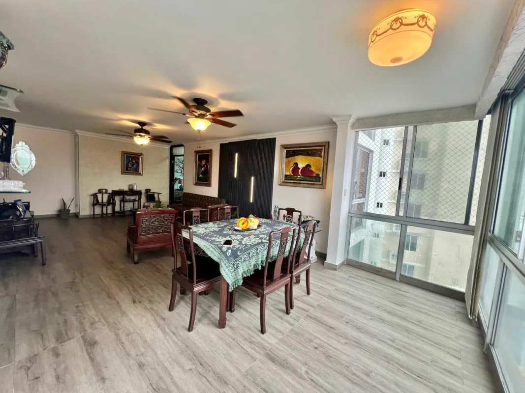 Open plan living and dining area with large windows wood floor PH Hato Pintado apartment for rent