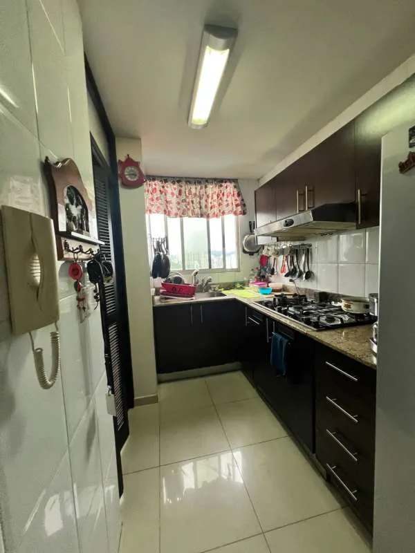 Apartment complex outdoor pool lounge chairs balconies La Loma Hato Pintado Tower Panama City