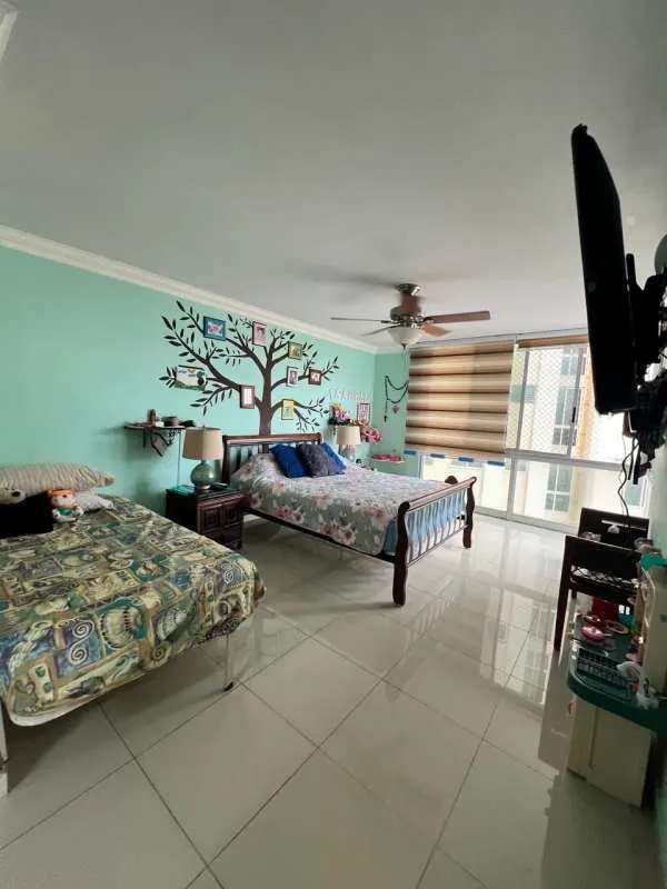 Bedroom with large windows city skyline view built-in closets PH Hato Pintado Tower