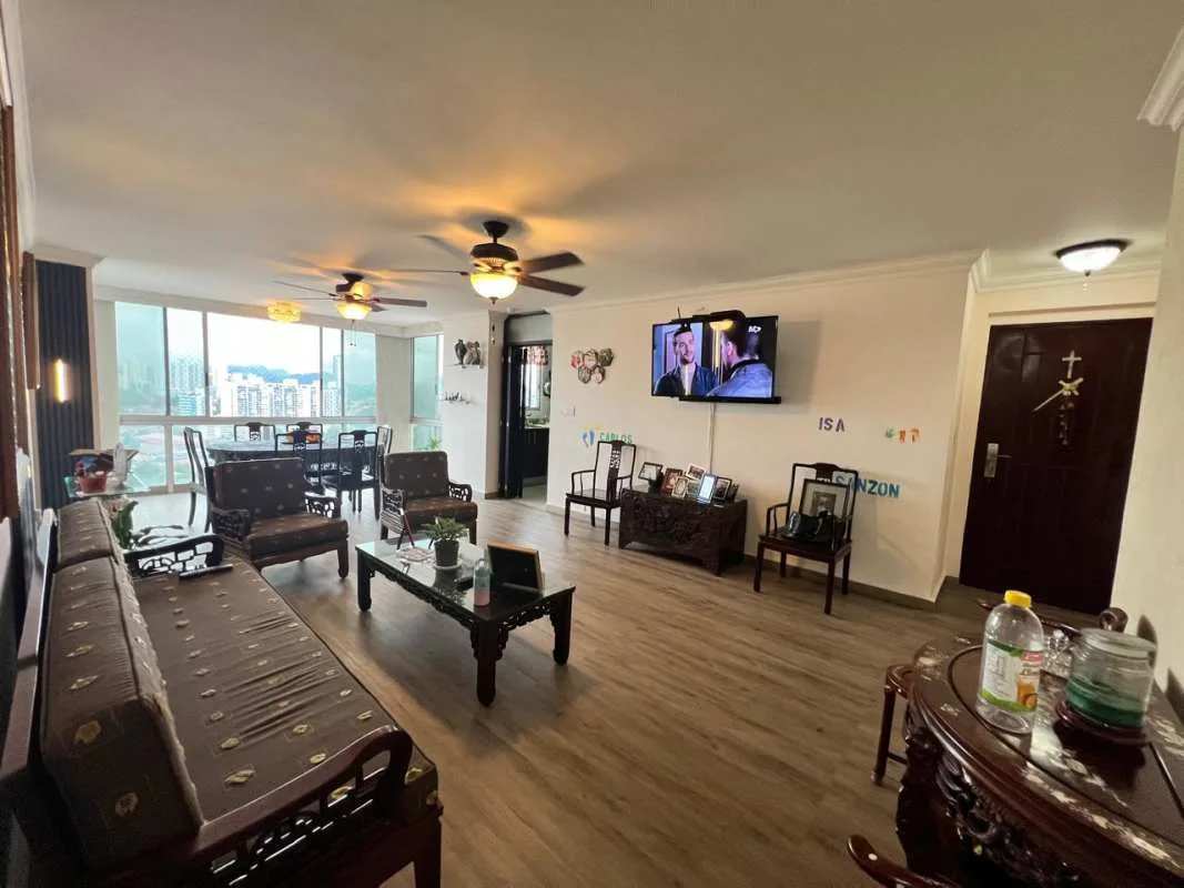 Traditional living room wooden furniture panoramic windows ceiling fans PH Hato Pintado Tower Panama