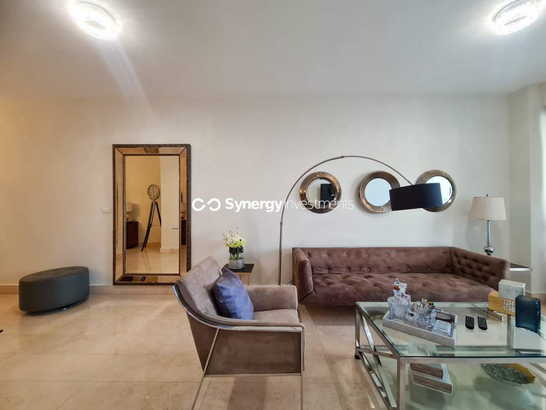 Luxury kitchen with marble countertops, stainless appliances and dining area