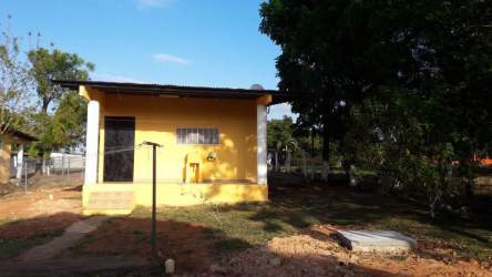 Single-story house with fenced yard and front porch in countryside La Paz Chame Panama