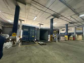 Loading bays and shipping container access area at warehouse in Zona Libre de Colón Panama