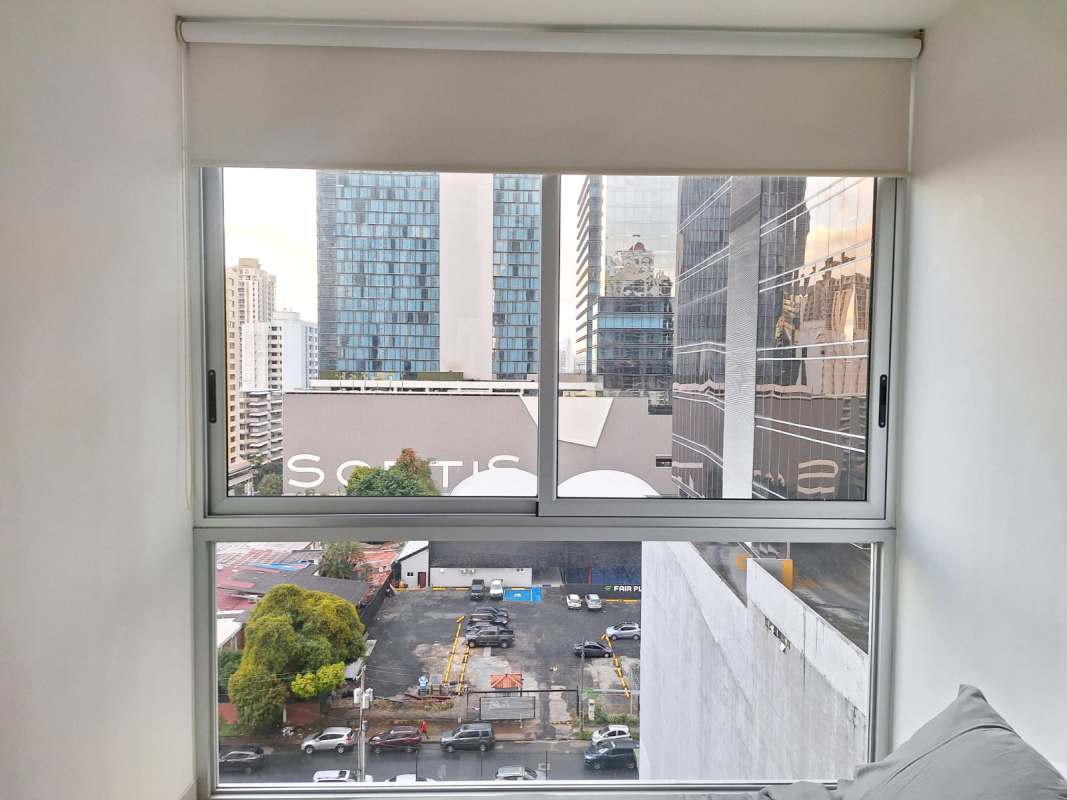 Furnished living space with city views, large window PH Urbana Obarrio Panama City