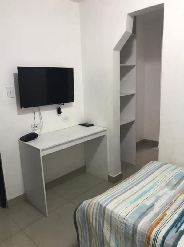 Shared kitchen with stove refrigerator and microwave for tenants near University of Panama Bella Vista