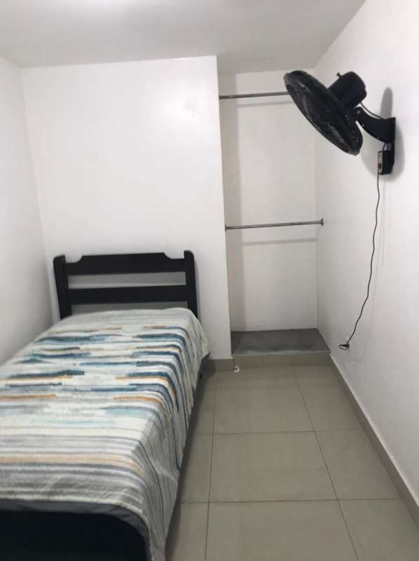 Contemporary bathroom with shower, sink, and toilet shared in rental next University Panama