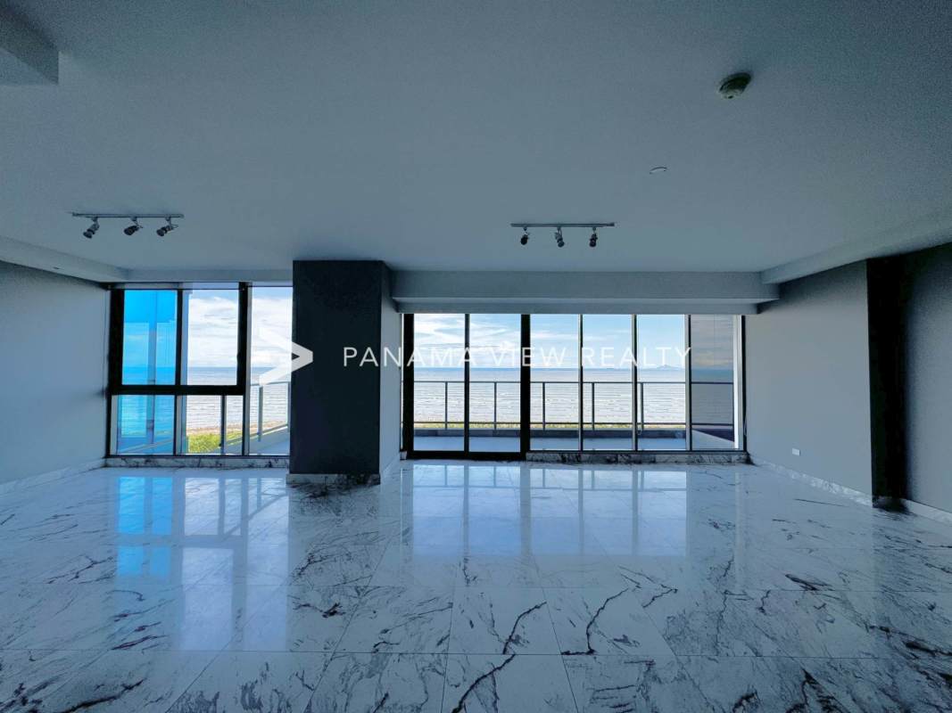 Kitchen with island marble finishes natural light PH Regalia condo Costa del Este Panama