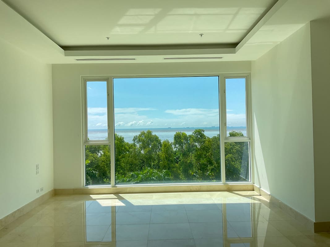 Large modern kitchen with central island marble countertops at PH Marea II Costa del Este Panama