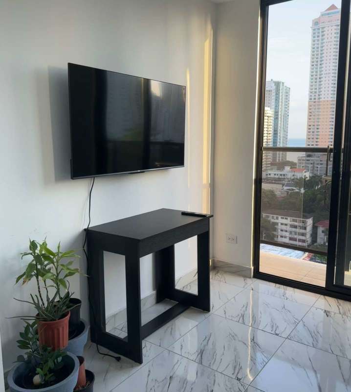 Living room modern furnishings balcony view PH Titanium Tower Panama