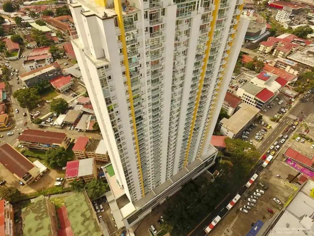 Outdoor pool area overlooking Panama City skyline in PH Vista Hermosa Vía España