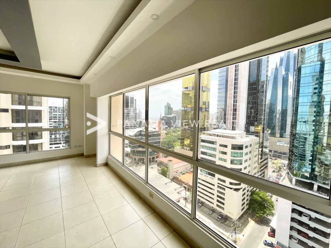 Large panoramic window living room with marble floors at Victoria Tower Obarrio Panama