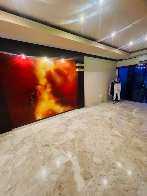 Large den entertainment room with marble floors and modern lighting Dos Mares Panama