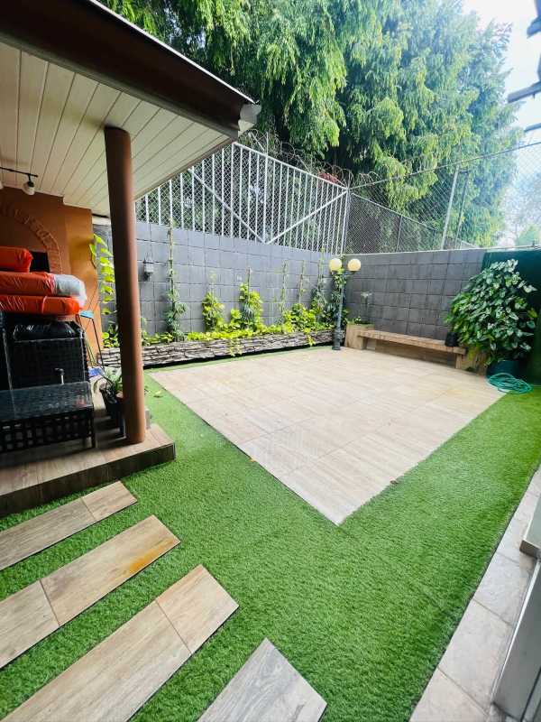 Modern kitchen with granite counters, stainless appliances in Dos Mares Panama luxury home for rent