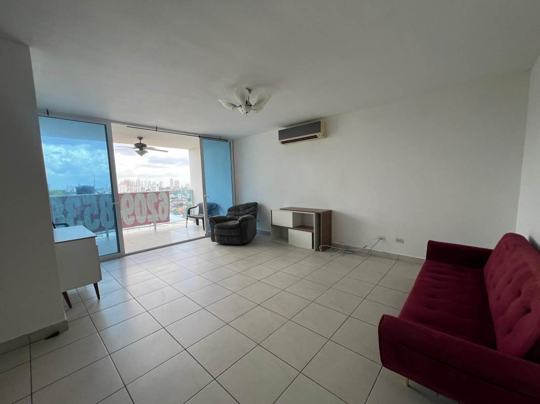 Modern living room with balcony access split AC tiled floor PH Lexington Tower Betania Panama City
