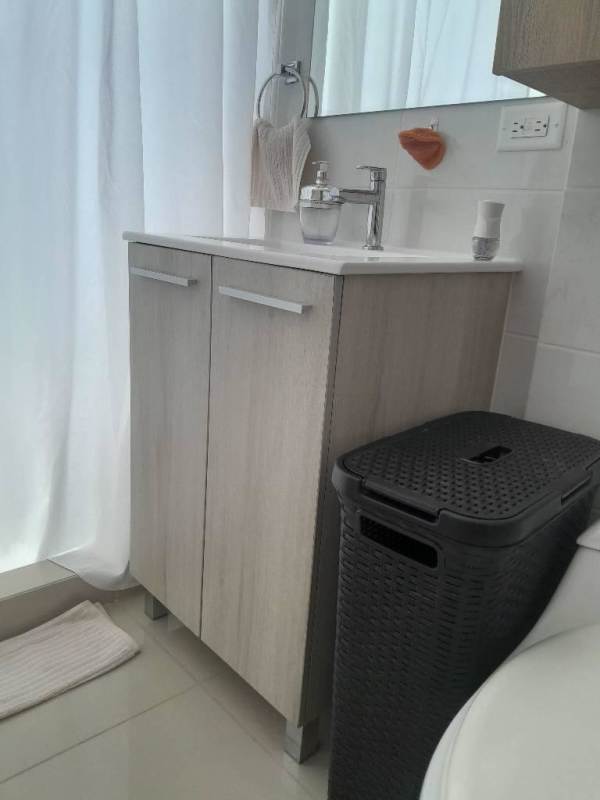 Furnished kitchen with breakfast bar and appliances in Coral Plaza Panama