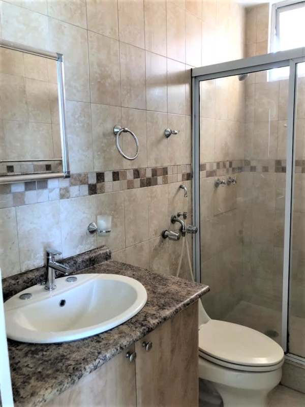 Bathroom with glass shower enclosure, granite counter in PH San Francisco Bay Panama