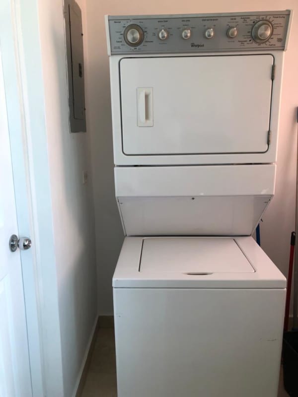 Kitchen with granite counters, gas stove, stainless fridge in PH San Francisco Bay Panama City rental