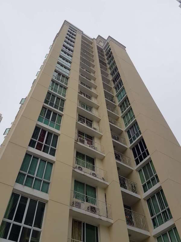 Tall condominium building with balconies PH San Francisco Bay Panama City