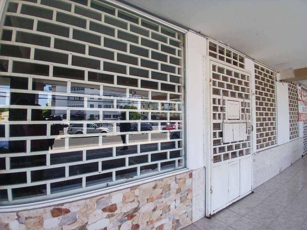 Covered visitor parking and security gates outside PH Jenny III commercial unit Parque Lefevre Panama