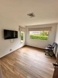 Spacious double car garage with laundry appliances in luxury house Panama Pacifico