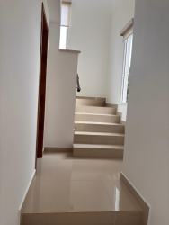 Bright hallway with staircase natural light modern finishes luxury home Panama